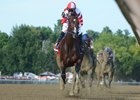 Songbird leaves the competition behind in the Coaching Club American Oaks<br><a target="blank" href="http://photos.bloodhorse.com/AtTheRaces-1/At-the-Races-2016/i-cPQDpJq">Order This Photo</a>