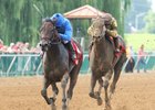Innovative Idea (left) gets the victory in the Groupie Doll