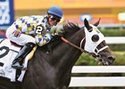 Jockey Jose Ortiz is all smiles as Laoban broke his maiden and won the 53rd running of the Jim Dandy at Saratoga 7/30/16.