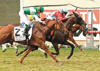 Larkin Armstrong's Harmonize and jockey Junior Alvarado (center, grey cap) win the Grade I $300,000 Del Mar Oaks Saturday, August 20, 2016 at Del Mar Thoroughbred Club, Del Mar, CA.
©Benoit Photo