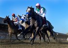 Arrogate passes the clubhouse for the first time on the way to a track record win in the 147th running of the Travers Stakes at Saratoga Race Course August 27, 2016 in Saratoga Springs, N.Y.