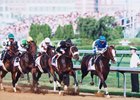 John Dowd is best known for training grade II winner Songandaprayer, shown leading early in the 2001 Kentucky Derby