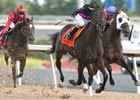 Jockey Rafael Hernandez guides Stacked Deck to victory in the $100,000 Ontario Jockey Club Stakes Sept. 11, 2016 at Woodbine Racetrack.