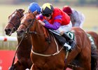 The Last Lion and Joe Fanning (red) winning the 2016 Juddmonte Middle Park Stakes from Blue Point
