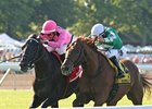 Triple Threat (left) winning the 2015 Monmouth Stakes (gr. IIT).