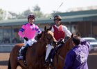 Mario Gutierrez is all smiles after winning the Breeders' Cup Juvenile Fillies on Champagne Room