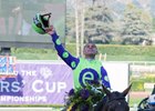 Javier Castellano celebrates aboard New Money Honey after winning the Juvenile Fillies Turf
