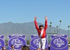 Lefranco Dettori celebrates winning the Filly Mare Turf (gr. I) at Santa Anita on Nov. 5, 2016, in Arcadia, California.