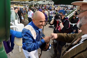 Mike Smith Celebrates after winning the Las Vegas Dirt Mile atop Tamarkuzat Santa Anita on Nov. 4, 2016, in Arcadia, Calif.