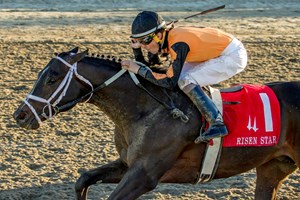 Brian Hernandez, Jr. guides Girvin to victory in the 45th running of the Risen Star Stakes.