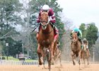 Gun Runner wins the 2017 Razorback Handicap (G3)