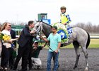 Dr. Kendall Hansen kisses Fast and Accurate after his Spiral victory