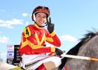 Apprentice jockey Carlos Carrasco after winning his second race of the day at Laurel