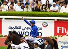 Thunder Snow is led to the winner's enclosure after
a head victory in the UAE Derby