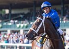 Paco Lopez shares a moment with Dickinson after her win at Keeneland