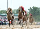 Daddys Lil Darling (outside) missed running down Abel Tasman in the Kentucky Oaks by 1 1/4 lengths
