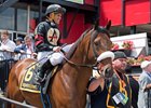 Shaman Ghost and Javier Castellano en route to a determined neck victory in the Pimlico Special Stakes