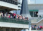 Fans look out from a balcony at Churchill Downs during the 2017 Kentucky Derby