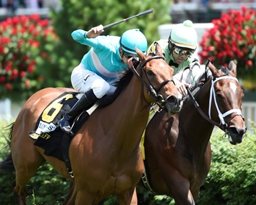 Roca Rojo with jockey Florent Geroux in the saddle out duels Believe in Bertie to the wire in the 32 running of The Churchill Distaff Turf Mile at May 6, 2017 at Churchill Downs in Louisville, Kentucky.