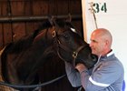 West Point partner Terry Finley has an affectionate moment with Always Dreaming May 7