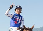 Rafael Bejarano returns to the winner's circle aboard Faypien after taking the Summertime Oaks