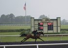 A horse breezes in the rain at OBS June 7