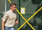 Dr. Tim DeLatte, an attending veterinarian, leaves the quarantine area at Belmont Park