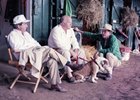 Shug McGaughey talks things over with Dinny Phipps and Will Farish at Saratoga in a photo featured in the Tony Leonard exhibit at the Hall of Fame.