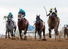 Ransom the Moon (inside) wins the Bing Crosby, with Roy H, Moe Candy (outside), and a riderless Drefong just behind