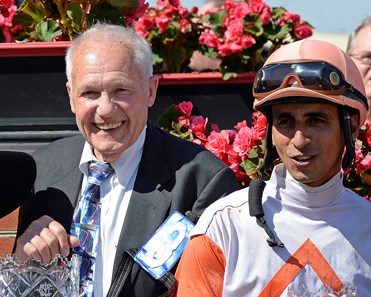 King Leatherbury
Ben's Cat with Julian Pimentel wins the Jim McKay Turf Sprint. King Leatherbury owner/trainer.
Scenes at Pimlico in preparation for the Preakness Stakes (gr. I) on May 15, 2015.
R9JimMcKayTurf Sprint_5_14 image549
Photo by Anne M. Eberhardt