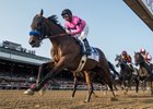 West Coast ridden by jockey Mike Smith lead wire to wire as he passes the clubhouse for the first time on the way to the win in the 148th running of The Travers Stakes at the Saratoga Race Course in Saratoga Springs, N.Y.