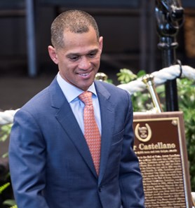 Jockey Javier Castellano walks past his bronze Hall of Fame plaque at the National Museum of Racing and Hall of Fame induction ceremony held Aug. 4, 2017 at the Fasig Tipton auditorium in Saratoga Springs, N.Y.