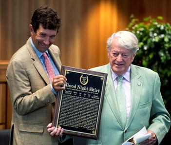 Harold A. Sonny Via Jr. owner of Good Night Shirt, right holds the Hall of Fame Plaque with his trainer at the National Museum of Racing and Hall of Fame induction ceremony held Aug. 4, 2017 at the Fasig Tipton auditorium in Saratoga Springs, N.Y.