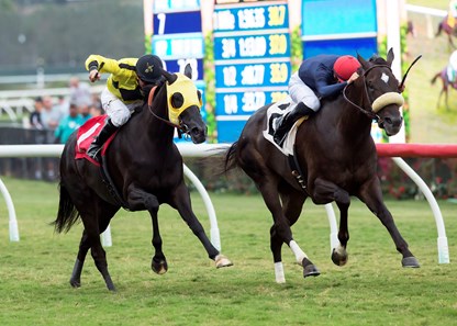 Majestic Heat and jockey Flavien Prat, right, outleg Moonless Sky (Kent Desormeaux), left, to win the $150,000 Solana Beach Stakes, Friday, August 11, 2017 at Del Mar Thoroughbred Club, Del Mar CA.