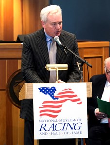 Thomas Gaines, son of John R. Gaines accepts the honor for his father at the National Museum of Racing and Hall of Fame induction ceremony held Aug. 4, 2017 at the Fasig Tipton auditorium in Saratoga Springs, N.Y.