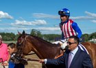 Kaleem Shah leads American Gal and jockey Jose Ortiz into the winner's circle