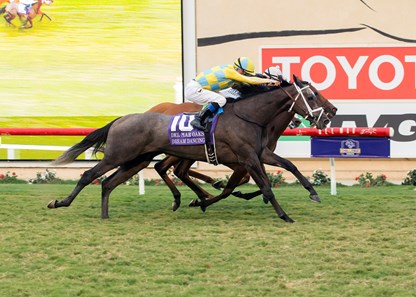 John C. Oxley's Dream Dancing and jockey Julien Leparoux, outside, overpower Beau Recall (Joseph Talamo), middle, and Madam Dancealot (Jamie Theriot), inside, to win the G1, $300,000 Del Mar Oaks, Saturday, August 19, 2017 at Del Mar Thoroughbred Club, Del Mar CA.