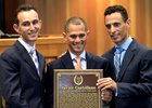 Jockey Javier Castellano (center) holds his Hall of Fame plaque, along with fellow Hall of Fame riders Ramon Dominguez (left) and John Velazquez