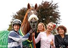Jockey Jim Crowley, groom Radka Hovadova, and owner Maria Niarchos after the Juddmonte International at York