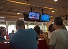 Horseplayers at the betting windows at Saratoga Race Course