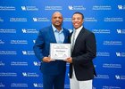 Ronald Mack (left), executive director of the Legacy Equine Foundation, with inaugural scholarship winner Dion Compton
