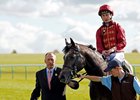 Roaring Lion is led into the winner's enclosure after the Juddmonte Royal Lodge Stakes