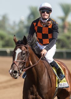 Jockey Flavien Prat guides Paradise Woods to the winner's circle after their victory in the Zenyatta Stakes at Santa Anita Park Sept. 30