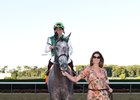 Stephanie Seymour Brant leads Significant Form into the Belmont Park winner's circle