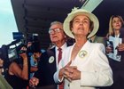 Beverly Lewis watches Charismatic during his run for the Triple Crown at Belmont Park