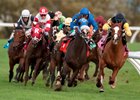 Bullards Alley takes the lead on the turn in the Pattison Canadian International at Woodbine