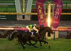 Kitasan Black narrowly scores over Satono Crown on the soft turf in the rain at Tokyo