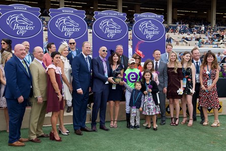 Connections of Rushing Fall celebrate wining the Breeders Cup Juvenile Fillies Turf at Del Mar on November 3, 2017.