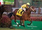 Lovely Bernadette takes flight en route to victory in the Mrs. Revere Stakes at Churchill Downs