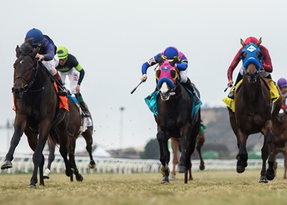 Mo Town and jockey John Velazquez, left, overpower Big Score (Flavien Prat), second from left, Sharp Samurai (Gary Stevens), right, to win the G1T, $300,000 Hollywood Derby, Saturday, November 25, 2017 at Del Mar Thoroughbred Club, Del Mar CA.